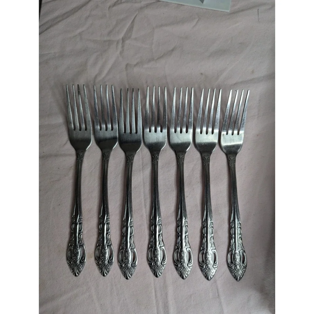 7 lot H.F. LTD Stainless stamped flower pattern 7